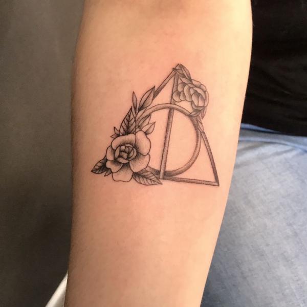 deathly hallows and roses inner forearm tattoo black and grey