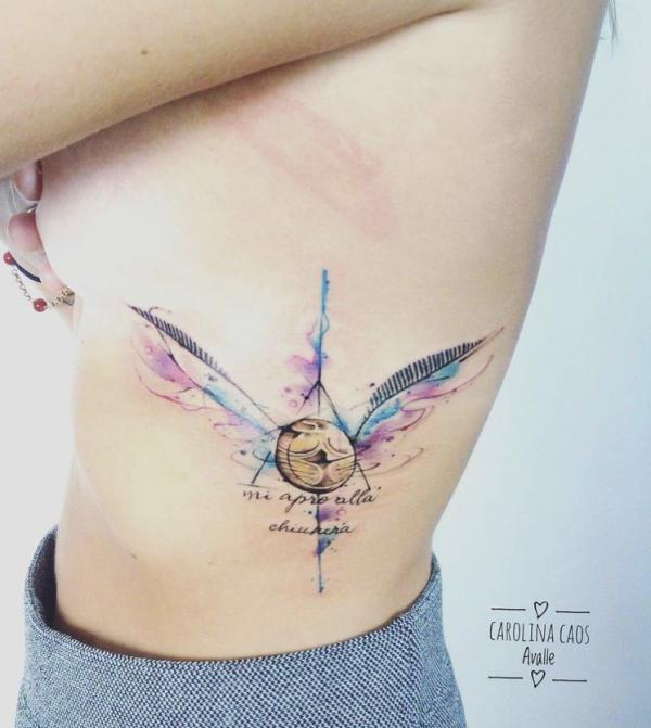 deathly hallows and the Golden Snitch side tattoo watercolor