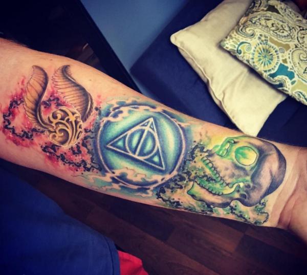 deathly hallows with Golden Snitch and skull tattoo