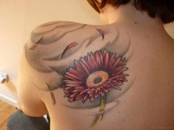 gerbera daisy shoulder blade tattoo