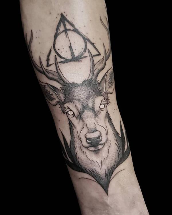 harry stag and deathly hallows tattoo black and grey