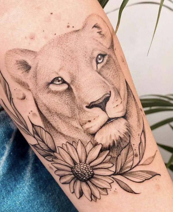 leo lioness with sunflower tattoo