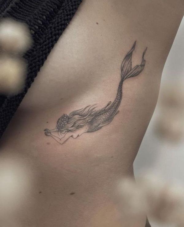 mermaid side boob tattoo