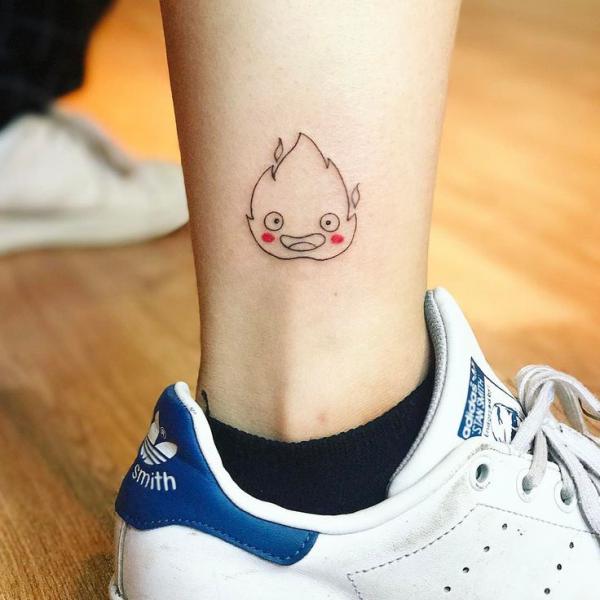 minimalist Calcifer ankle tattoo