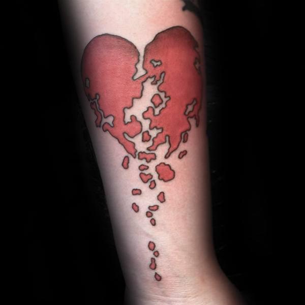 shattered heart forearm tattoo