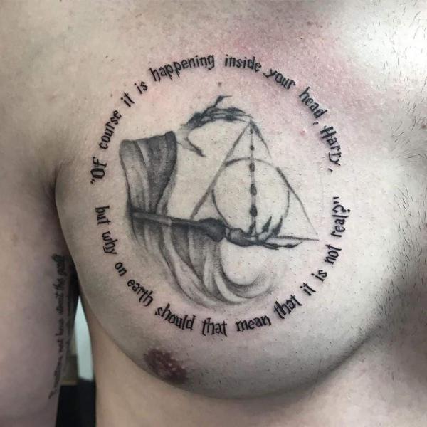 skeleton hands holding deathly hallows tattoo with quote Of course it is happening inside your head Harry but why on earth should that mean that it is not real