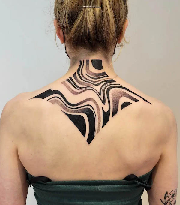 Abstract pattern upper back tattoo by @finite.not_.infinite