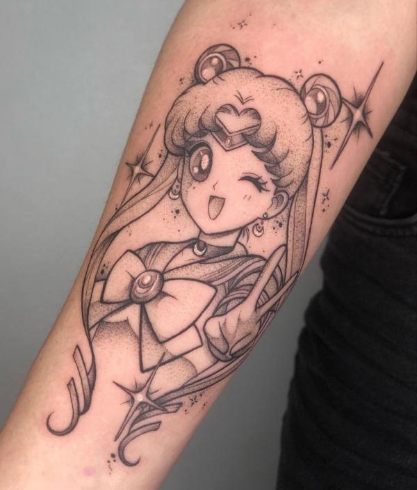 Black and grey sailor moon with bow and star tattoo