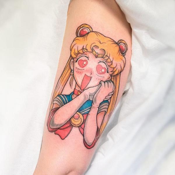 Cute Sailor Moon bicep tattoo