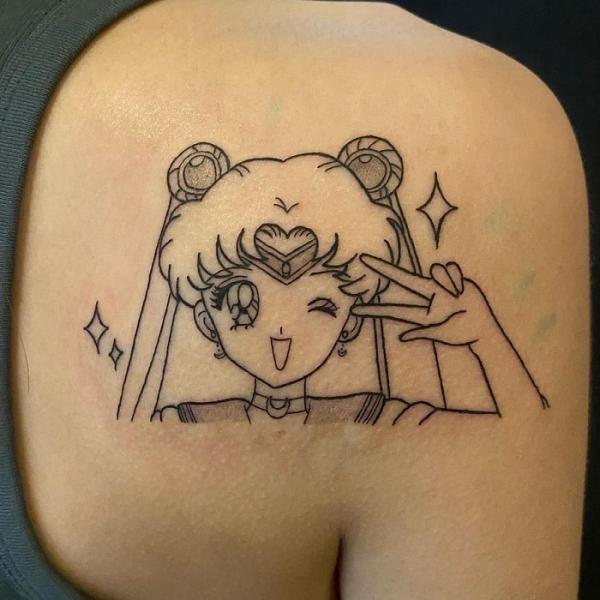 Fine line Sailor Moon shoulder blade tattoo