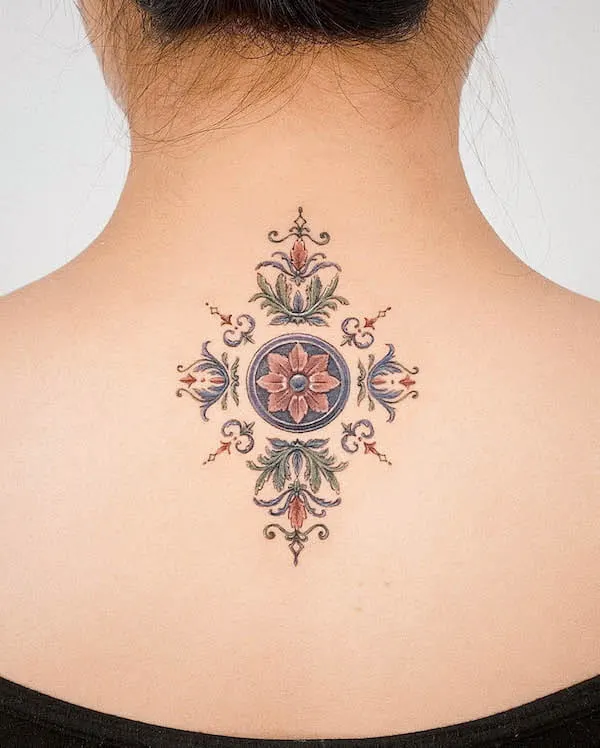 Floral ornament back tattoo by @youngchickentattoo