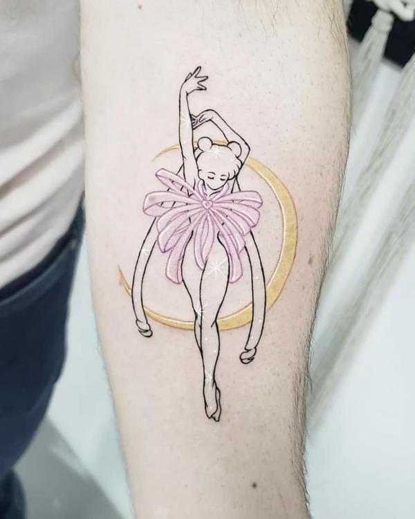 Forearm sailor moon line work tattoo