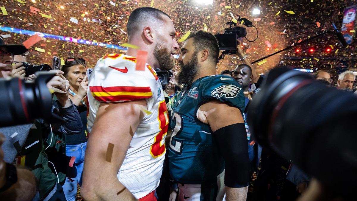 Feb 12, 2023; Glendale, Arizona, US; Kansas City Chiefs tight end Travis Kelce (87) talks with his brother Philadelphia Eagles center Jason Kelce (62) after Super Bowl LVII at State Farm Stadium. Mandatory Credit: Mark J. Rebilas-USA TODAY Sports