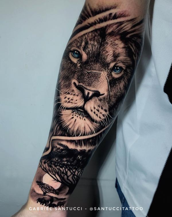 Lion king head and full moon tattoo