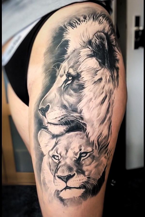 Liong king and cub tattoo thigh