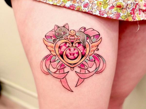 Luna and sailor moon crisis tattoo on thigh