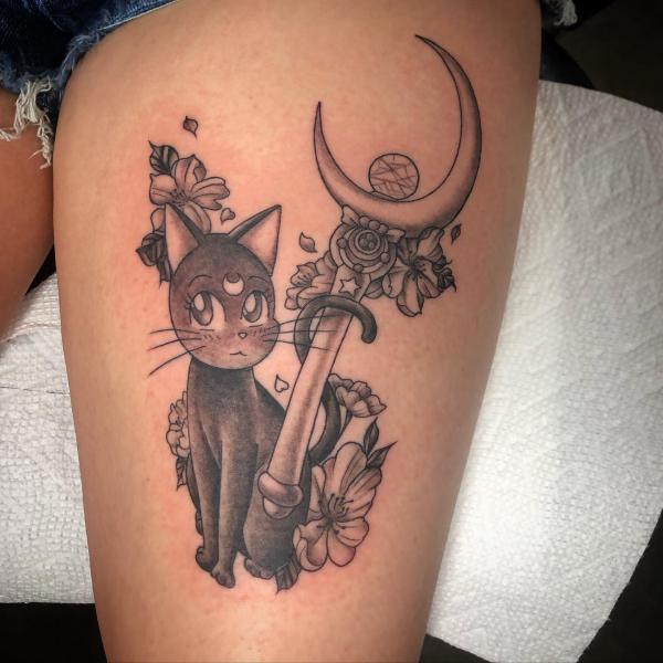 Luna thigh tattoo