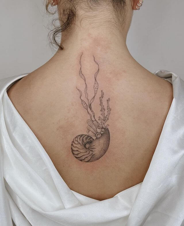 Ocean theme back tattoo