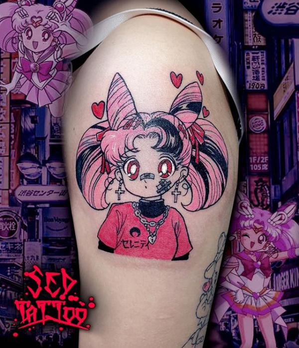 Sailor Chibi Moon tattoo on upper arm