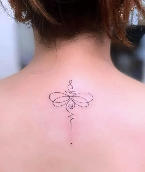 Symbolic dragonfly back tattoo by @pirate_jax