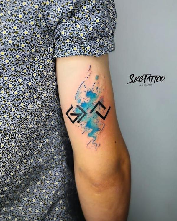 Watercolor god is greater than the highs and lows back of arm tattoo