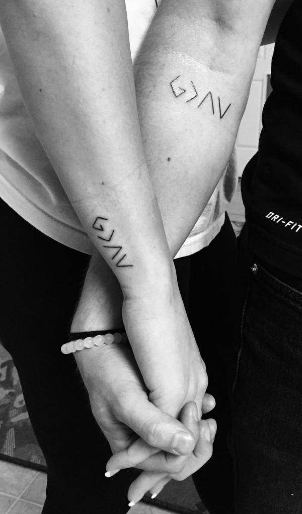 god is greater than the highs and lows matching tattoos for couple