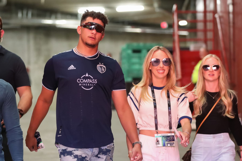 KANSAS CITY, MO - APRIL 13: Patrick and Brittany Mahomes walk down the tunnel before an MLS match between Inter Miami CF and Sporting Kansas City on Apr 13, 2024 at GEHA Field at Arrowhead Stadium in Kansas City, MO. (Photo by Scott Winters/Icon Sportswire via Getty Images)