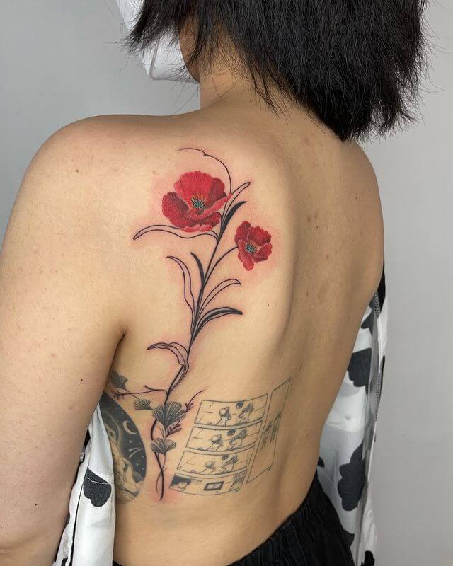 poppy tattoo on back