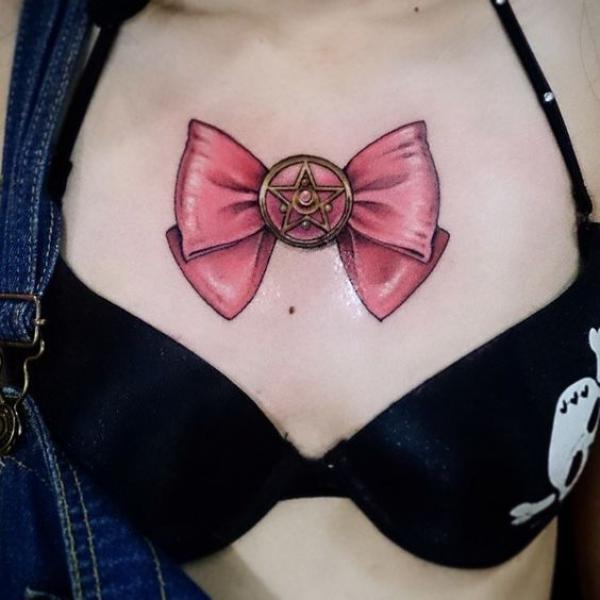 sailor moon bow sternum tattoo