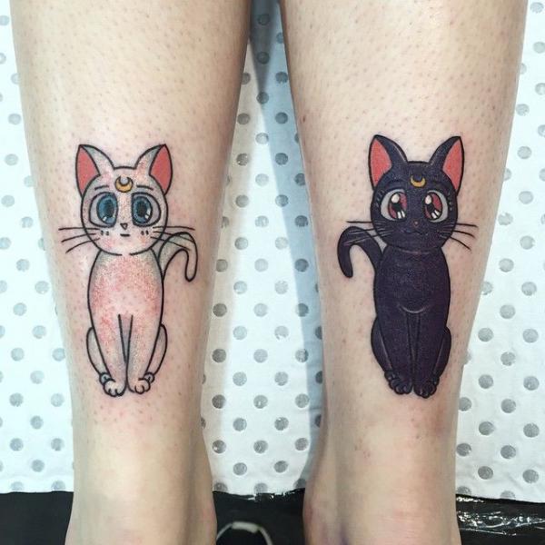 sailor moon luna and artemis tattoo on lower leg