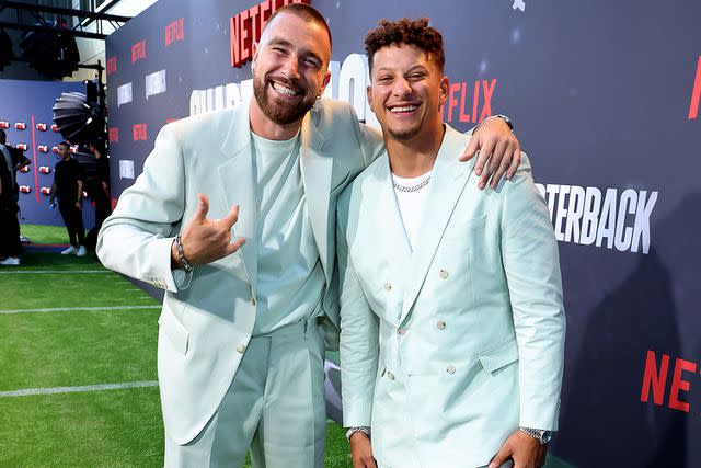<p>Randy Shropshire/Getty Images</p> Travis Kelce and Patrick Mahomes attend the Netflix Premiere of "Quarterback"
