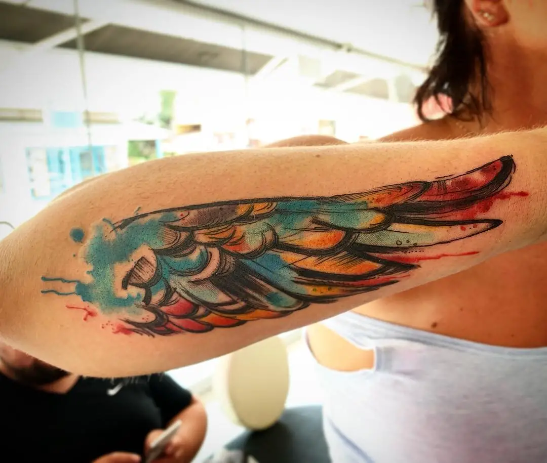 Artsy Eagle Wing Tattoo