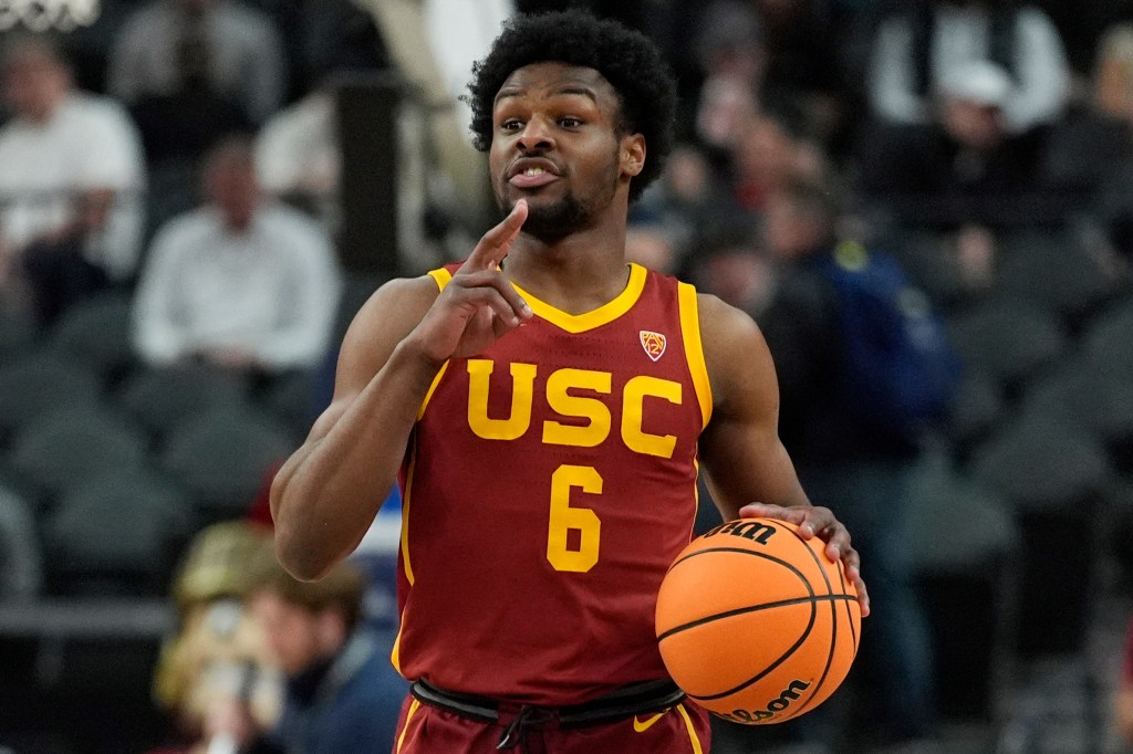 Southern California's Bronny James (6) drives up the court against Washington during the first half of an NCAA college basketball game in the first round of the Pac-12 tournament Wednesday, March 13, 2024, in Las Vegas.