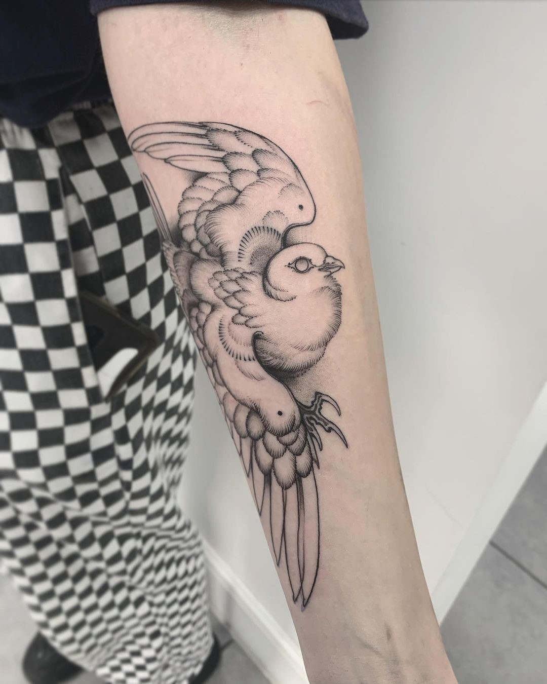 Feminine Dove Tattoo