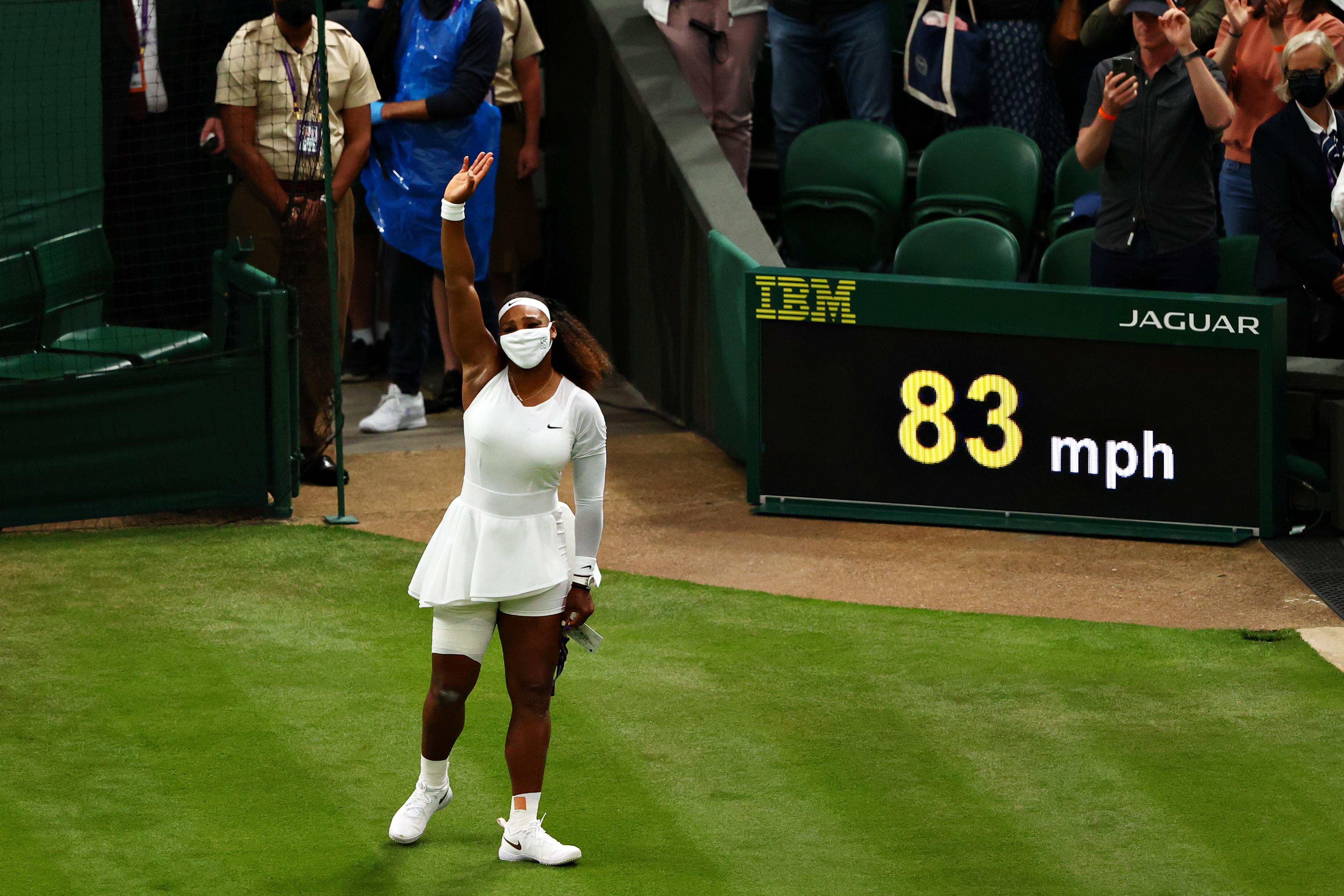 Serena Williams waves to fans after retiring from the match with an injury during The Championships Wimbledon 2021 at All England Lawn Tennis and Croquet Club on June 29, 2021.