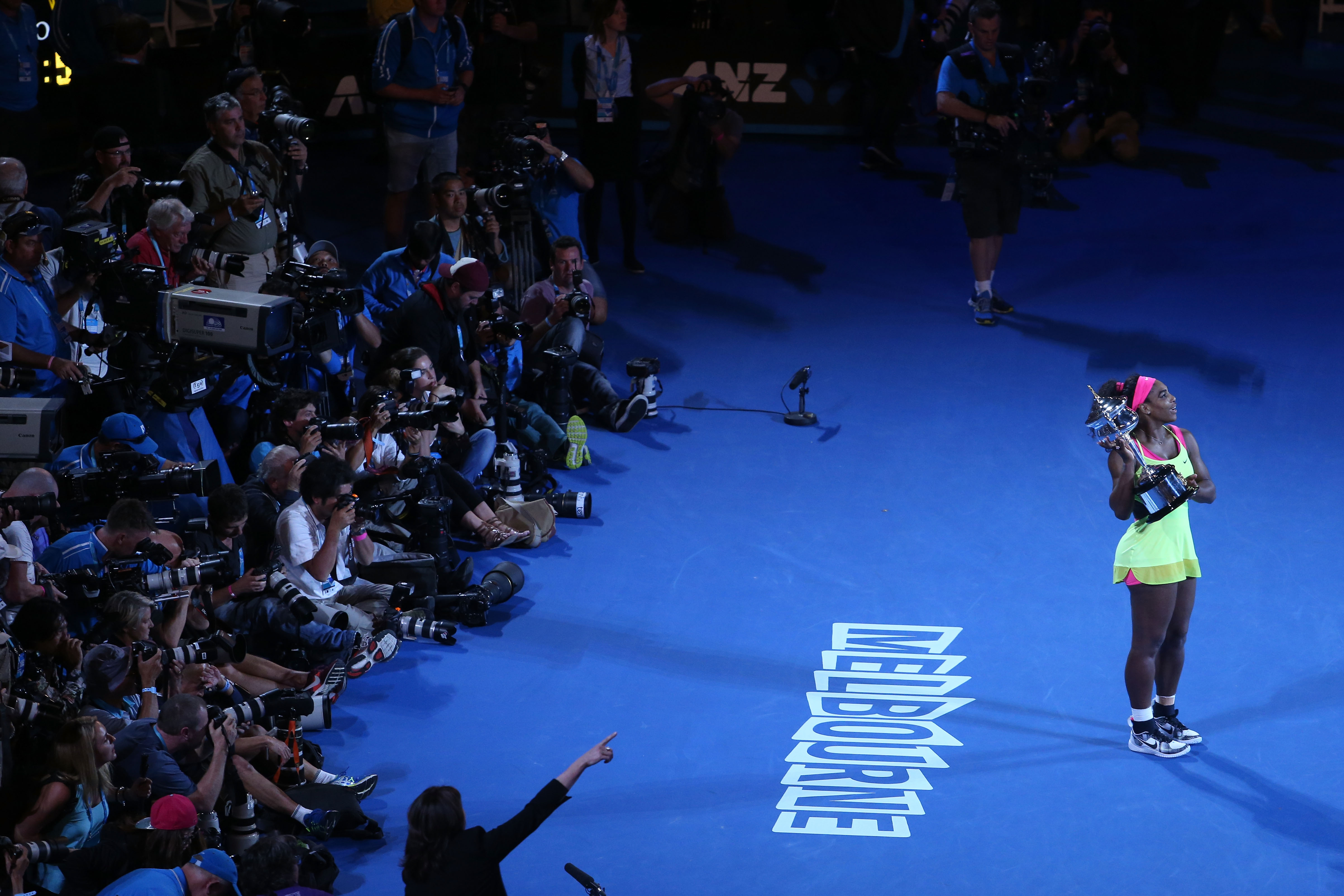 Serena Williams embraces the spotlight, holding the Daphne Akhurst Memorial Cup after winning the women's final match during the 2015 Australian Open at Melbourne Park on January 31, 2015.