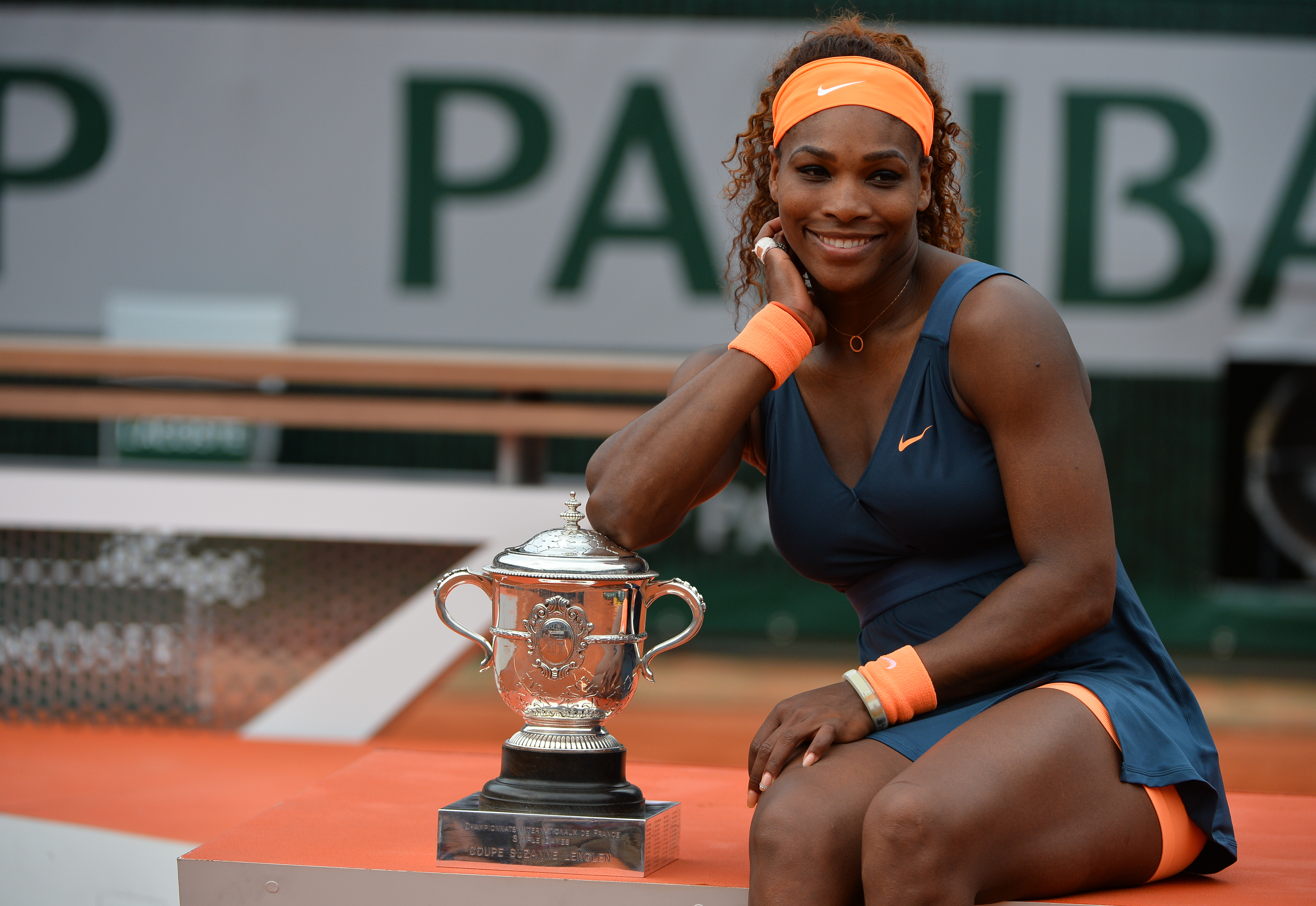 Serena Williams poses with her trophy after winning the Women's Final of the French Tennis Open 2013 at Roland-Garros Stadium in Paris, France on June 8, 2013.