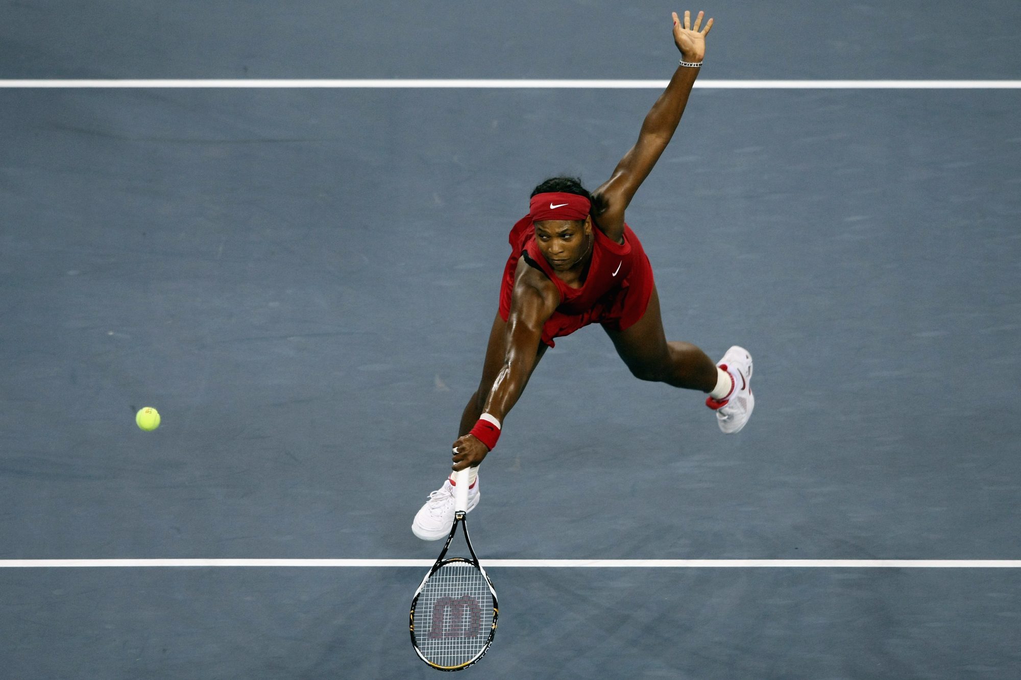 Serena Williams returns the ball during the women's singles finals of the 2008 U.S. Open at the USTA Billie Jean King National Tennis Center on September 7, 2008.