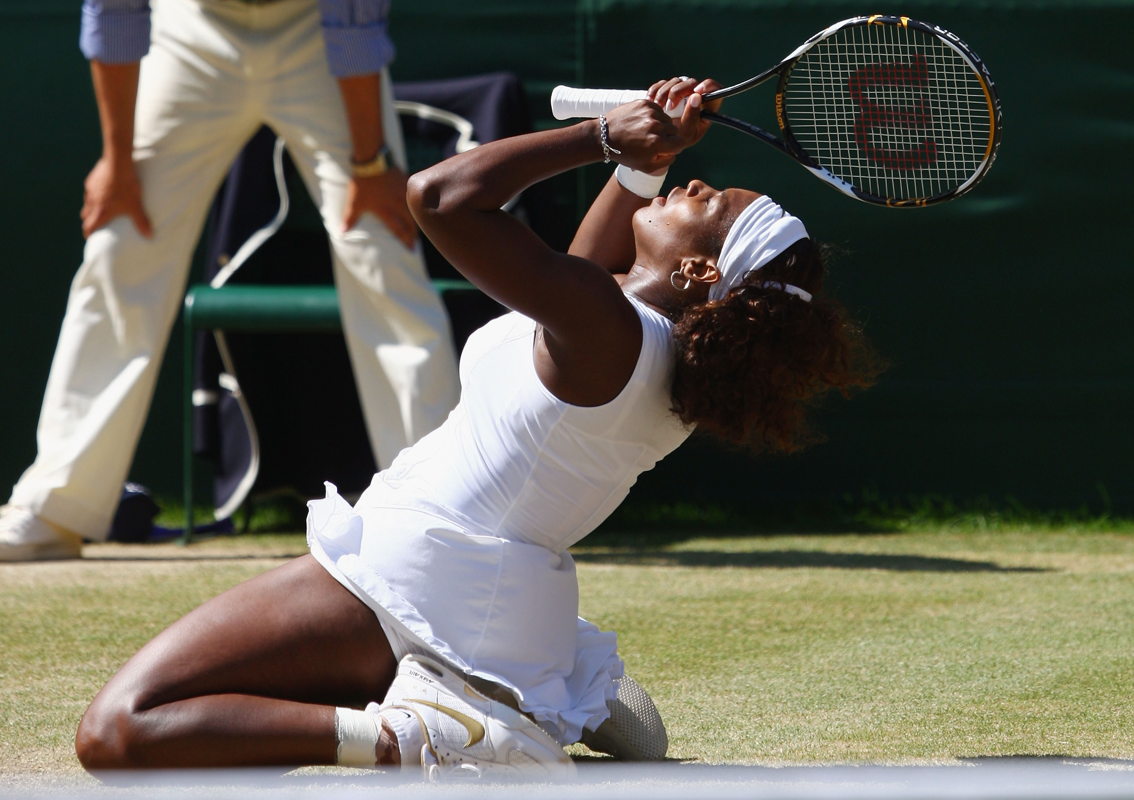 Serena Williams looks up to the sky and celebrates during the women's singles final match at the Wimbledon Lawn Tennis Championships at the All England Lawn Tennis and Croquet Club on July 4, 2009.