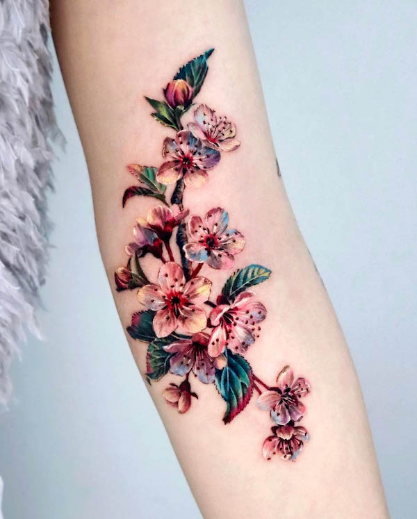 Gorgeous realism cherry blossom tattoo by @non_lee_ink