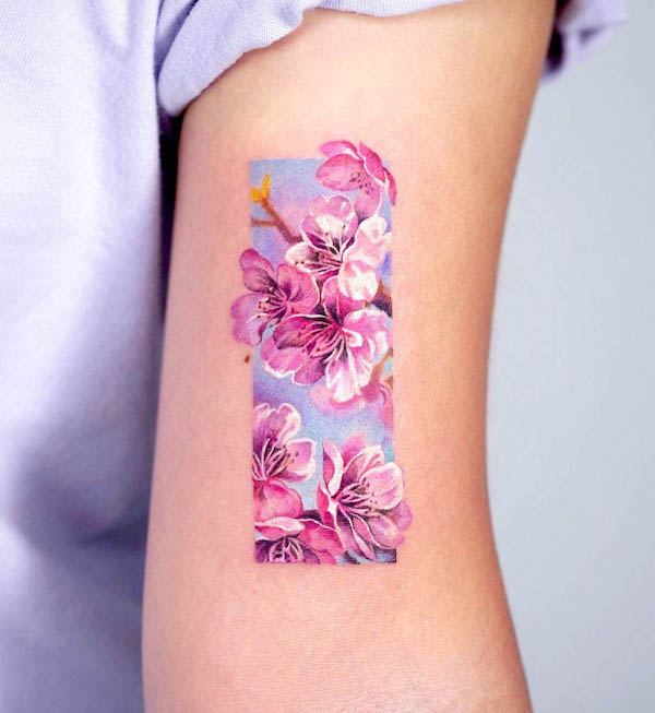 Realism cherry blossom tattoo by @tattooist_sigak