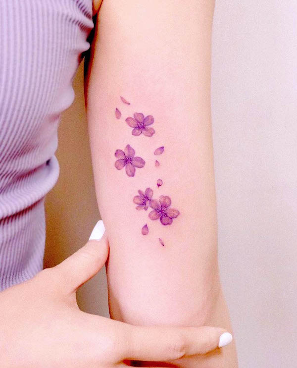 Unique purple cherry blossom tattoo by @peria_tattoo