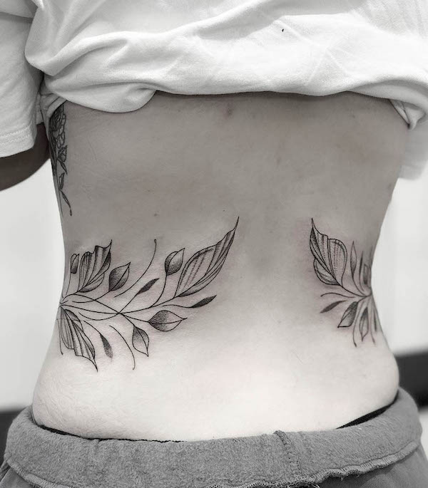 Wrap-around-the-waist tattoo by @inkbyfrances