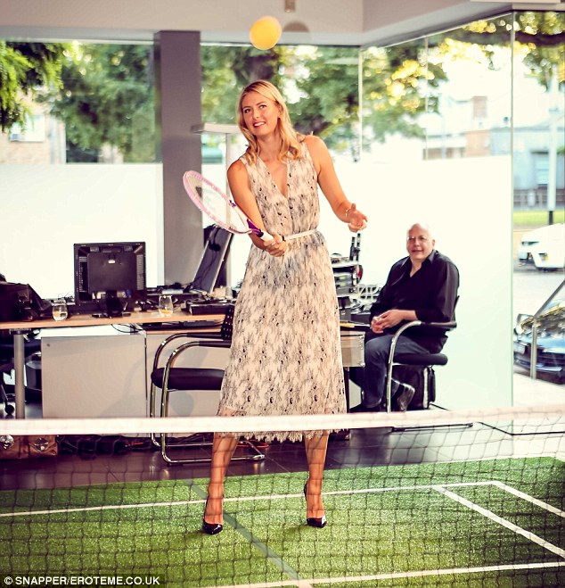 An Ace outfit: Maria Sharapova picked up her tennis racket and ball on a miniature court for the Porsche Women In Drive event in Melbourne