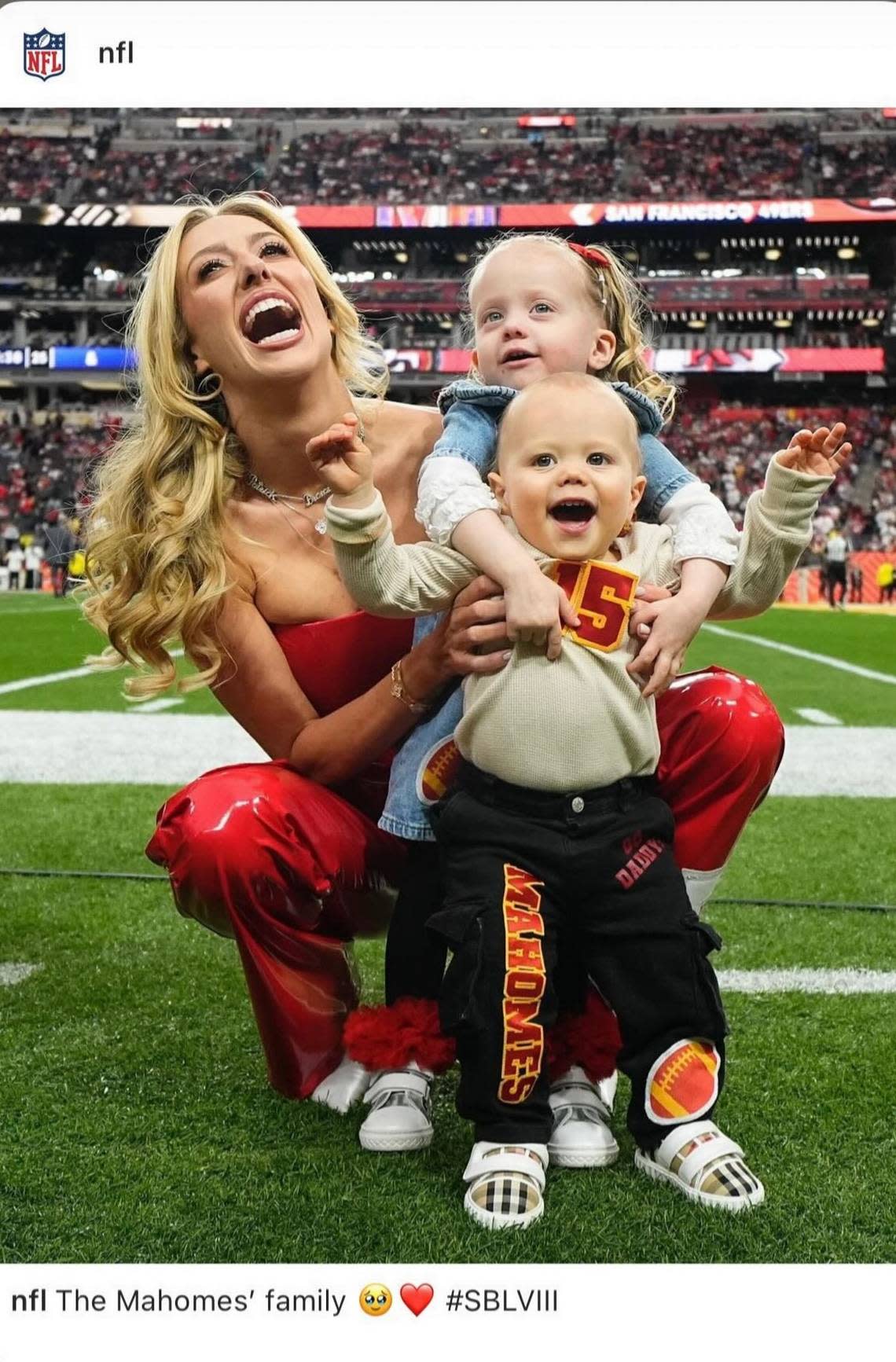 The Mahomes children and mom Brittany Mahomes on the sidelines to wish dad luck before the Super Bowl. NFL via Brittany Mahomes Instagram