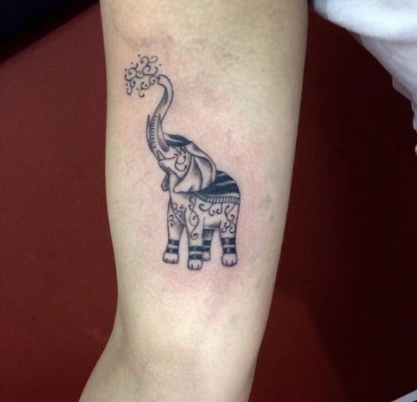 Small mini elephant tattoo on hand