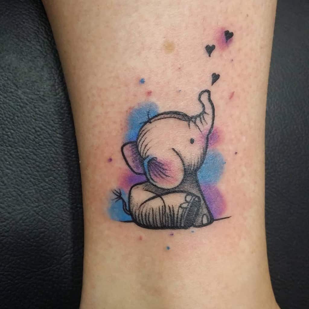 Cute little baby elephant tattoo with color