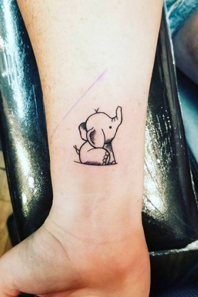 Mini small baby elephant tattoo photo