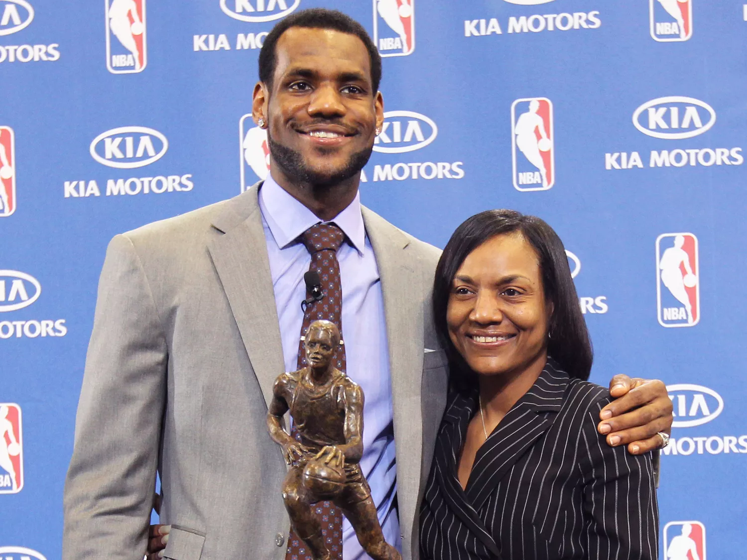 LeBron James of the Cleveland Cavaliers is joined by his mother Gloria James