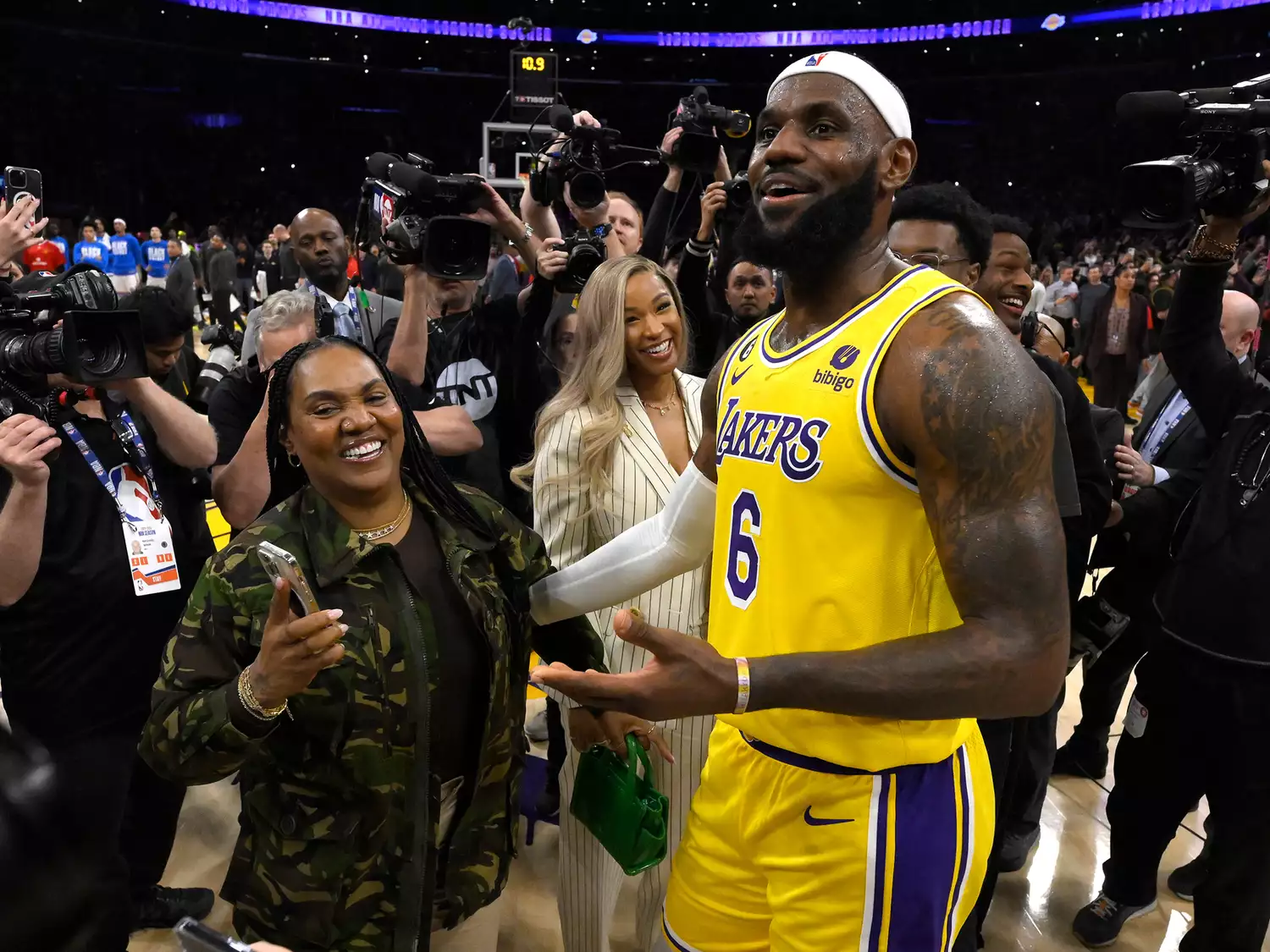 LeBron James #6 of the Los Angeles Lakers celebrates with his mom Gloria James